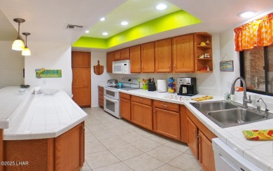 SELLER FINANCING AVAILABLE! Discover this beautifully furnished on London Bridge Golf Course in Arizona - for sale on GolfHomes.com, golf home, golf lot