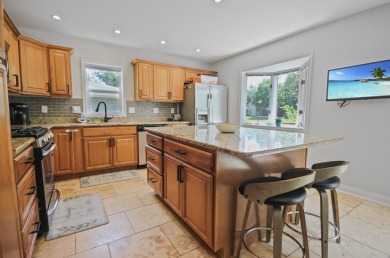 Luxury Living Awaits in This Golf Course Gem!Nestled in the on Lake of Four Seasons Country Club in Indiana - for sale on GolfHomes.com, golf home, golf lot