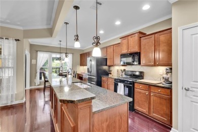 Discover the perfect blend of comfort, style, and active living on Canongate Golf At Sun City Peachtree in Georgia - for sale on GolfHomes.com, golf home, golf lot