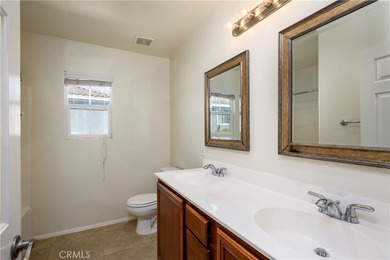 Welcome to this charming 3-bedroom, 2.5-bathroom home located in on Sierra Lakes Golf Club in California - for sale on GolfHomes.com, golf home, golf lot