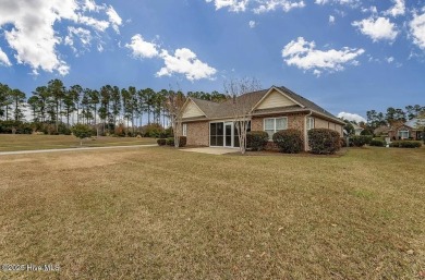 Welcome Home to Westport!  Offered for sale is a pond front home on Cape Fear National At Brunswick Forest in North Carolina - for sale on GolfHomes.com, golf home, golf lot
