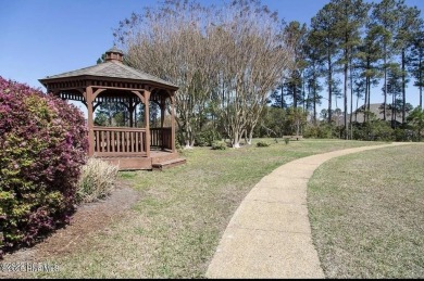 Welcome Home to Westport!  Offered for sale is a pond front home on Cape Fear National At Brunswick Forest in North Carolina - for sale on GolfHomes.com, golf home, golf lot