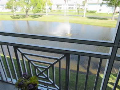 Well maintained END Unit condo with relaxing and peaceful views on Sabal Trace Golf and Country Club in Florida - for sale on GolfHomes.com, golf home, golf lot