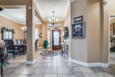 Step into a true showstopper in The Shores by Ray Hubbard. This on The Shores Country Club in Texas - for sale on GolfHomes.com, golf home, golf lot