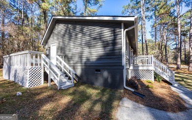 This 3-bedroom, 2-bath home has been completely updated from top on Golf Club of Macon in Georgia - for sale on GolfHomes.com, golf home, golf lot