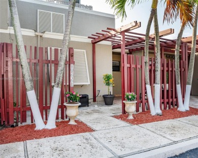 Charming townhouse nestled in Pembroke Pines, just .03 miles on Pembroke Lakes Golf Club in Florida - for sale on GolfHomes.com, golf home, golf lot
