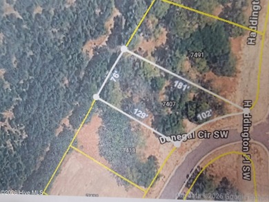 Nicely wooded home site in the Haddington section of Ocean Ridge on Sea Trail Golf Resort in North Carolina - for sale on GolfHomes.com, golf home, golf lot