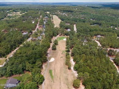 Discover the perfect home at 202 Woodland Circle in Foxfire, NC! on Foxfire Golf and Country Club in North Carolina - for sale on GolfHomes.com, golf home, golf lot