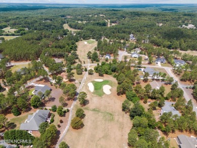 Discover the perfect home at 202 Woodland Circle in Foxfire, NC! on Foxfire Golf and Country Club in North Carolina - for sale on GolfHomes.com, golf home, golf lot