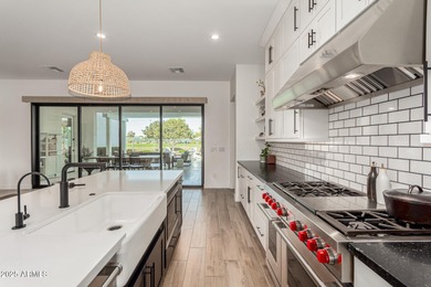 The modern Farmhouse ''St Helena'' model next to the Clubhouse on Sterling Grove Golf & Country Club in Arizona - for sale on GolfHomes.com, golf home, golf lot