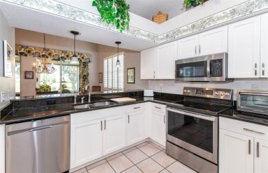 PRICE REDUCTION - Beautiful pond views that are enhanced by on Plantation Golf and Country Club in Florida - for sale on GolfHomes.com, golf home, golf lot