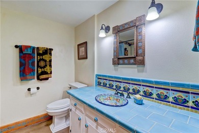 Welcome to this charming 2-bedroom, 2-bath casita in a 55+ on Laguna Woods Village Golf Course in California - for sale on GolfHomes.com, golf home, golf lot