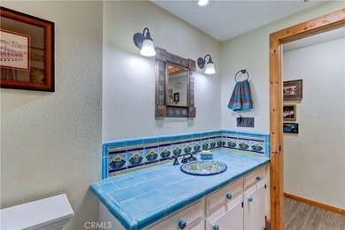 Welcome to this charming 2-bedroom, 2-bath casita in a 55+ on Laguna Woods Village Golf Course in California - for sale on GolfHomes.com, golf home, golf lot