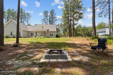 Discover the perfect home at 202 Woodland Circle in Foxfire, NC! on Foxfire Golf and Country Club in North Carolina - for sale on GolfHomes.com, golf home, golf lot