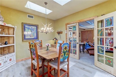 Welcome to this charming 2-bedroom, 2-bath casita in a 55+ on Laguna Woods Village Golf Course in California - for sale on GolfHomes.com, golf home, golf lot