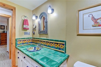 Welcome to this charming 2-bedroom, 2-bath casita in a 55+ on Laguna Woods Village Golf Course in California - for sale on GolfHomes.com, golf home, golf lot