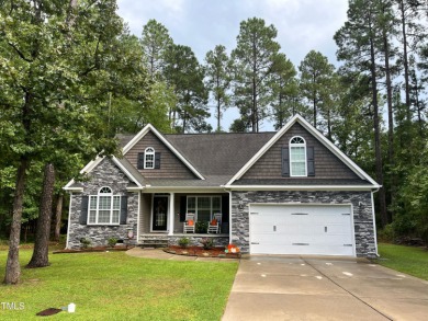 Follow your dream and live life to its fullest in this on Carolina Lakes Country Club in North Carolina - for sale on GolfHomes.com, golf home, golf lot