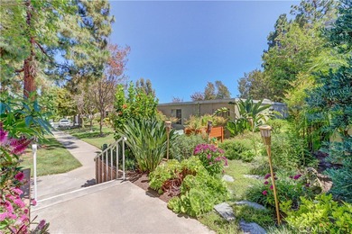 Welcome to this charming 2-bedroom, 2-bath casita in a 55+ on Laguna Woods Village Golf Course in California - for sale on GolfHomes.com, golf home, golf lot