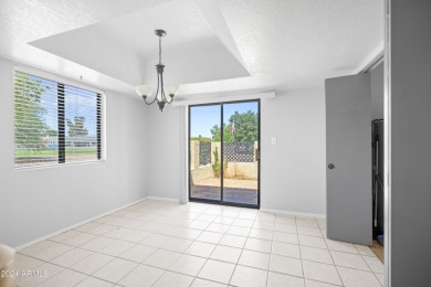 Welcome to this beautifully remodeled 2-bedroom end-unit on Tierra Grande Golf Club in Arizona - for sale on GolfHomes.com, golf home, golf lot