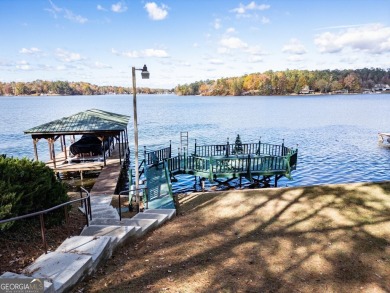 Panoramic big water views from this charming DEEDED lakefront on Turtle Cove Golf Course in Georgia - for sale on GolfHomes.com, golf home, golf lot