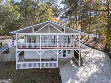 Panoramic big water views from this charming DEEDED lakefront on Turtle Cove Golf Course in Georgia - for sale on GolfHomes.com, golf home, golf lot