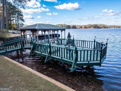 Panoramic big water views from this charming DEEDED lakefront on Turtle Cove Golf Course in Georgia - for sale on GolfHomes.com, golf home, golf lot