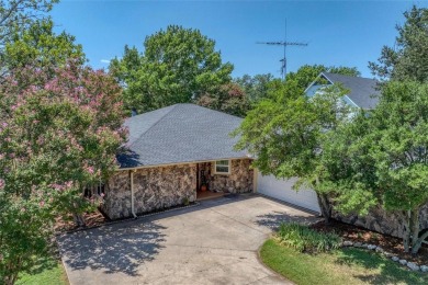 Tucked away on a quiet road, this well-laid out home on Lake on Lake Kiowa Golf Course in Texas - for sale on GolfHomes.com, golf home, golf lot