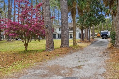 Discover this beautifully updated 4-bed, 3-bath home in the on Ladys Island Country Club in South Carolina - for sale on GolfHomes.com, golf home, golf lot