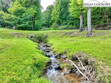 Perfect little getaway or vacation rental! Very cute mountain on Mountain Aire Golf Course in North Carolina - for sale on GolfHomes.com, golf home, golf lot