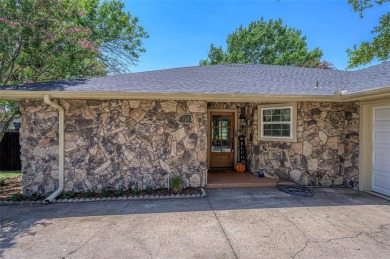 Tucked away on a quiet road, this well-laid out home on Lake on Lake Kiowa Golf Course in Texas - for sale on GolfHomes.com, golf home, golf lot