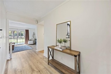 Discover this beautifully updated 4-bed, 3-bath home in the on Ladys Island Country Club in South Carolina - for sale on GolfHomes.com, golf home, golf lot