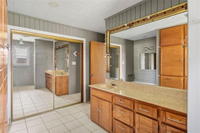 Tucked away on a quiet road, this well-laid out home on Lake on Lake Kiowa Golf Course in Texas - for sale on GolfHomes.com, golf home, golf lot