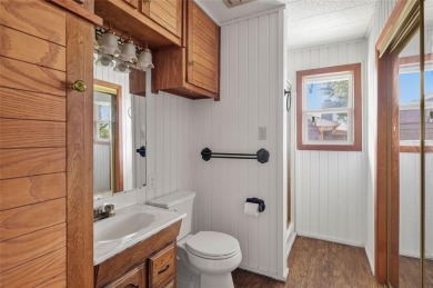 Tucked away on a quiet road, this well-laid out home on Lake on Lake Kiowa Golf Course in Texas - for sale on GolfHomes.com, golf home, golf lot