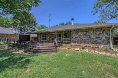 Tucked away on a quiet road, this well-laid out home on Lake on Lake Kiowa Golf Course in Texas - for sale on GolfHomes.com, golf home, golf lot
