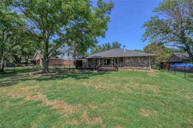 Tucked away on a quiet road, this well-laid out home on Lake on Lake Kiowa Golf Course in Texas - for sale on GolfHomes.com, golf home, golf lot