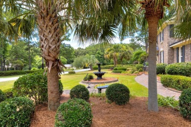 A stately two-story brick residence, exuding timeless elegance on Players Course At Wyboo Plantation in South Carolina - for sale on GolfHomes.com, golf home, golf lot