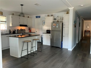 Welcome to the lush and lovely 55+ community of Sylvan Grove! on Rivard Golf and Country Club in Florida - for sale on GolfHomes.com, golf home, golf lot