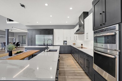 This home is an absolute showstopper-a modern masterpiece tucked on Dyes Walk Golf Course in Indiana - for sale on GolfHomes.com, golf home, golf lot