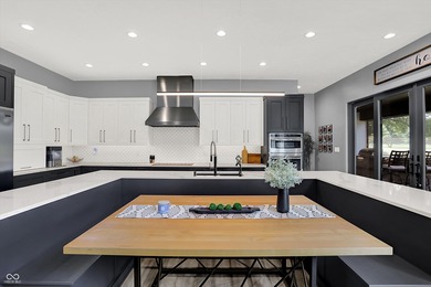 This home is an absolute showstopper-a modern masterpiece tucked on Dyes Walk Golf Course in Indiana - for sale on GolfHomes.com, golf home, golf lot