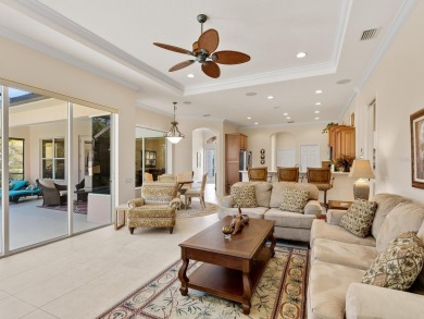 This wonderful 3-bedroom home with SPACIOUS BONUS ROOM, HEATED on Pelican Pointe Golf and Country Club in Florida - for sale on GolfHomes.com, golf home, golf lot