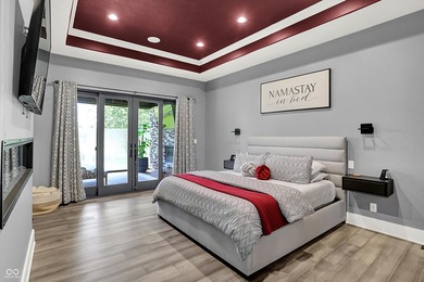 This home is an absolute showstopper-a modern masterpiece tucked on Dyes Walk Golf Course in Indiana - for sale on GolfHomes.com, golf home, golf lot