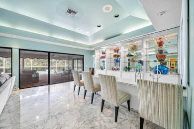 Situated on a quiet cul-de-sac street and just a short walk to on Delaire Golf and Country Club in Florida - for sale on GolfHomes.com, golf home, golf lot