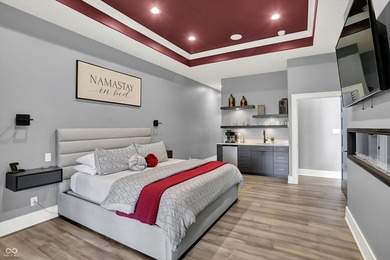 This home is an absolute showstopper-a modern masterpiece tucked on Dyes Walk Golf Course in Indiana - for sale on GolfHomes.com, golf home, golf lot