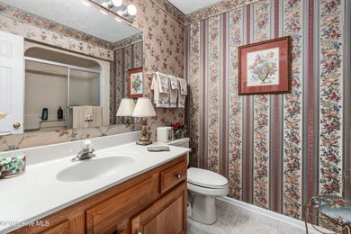 Welcome to 912 Rivage Promenade, a beautifully maintained on Beau Rivage Golf and Resort in North Carolina - for sale on GolfHomes.com, golf home, golf lot