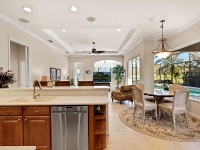 This wonderful 3-bedroom home with SPACIOUS BONUS ROOM, HEATED on Pelican Pointe Golf and Country Club in Florida - for sale on GolfHomes.com, golf home, golf lot