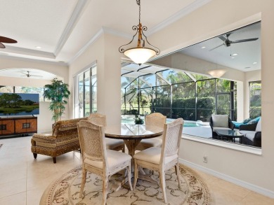 This wonderful 3-bedroom home with SPACIOUS BONUS ROOM, HEATED on Pelican Pointe Golf and Country Club in Florida - for sale on GolfHomes.com, golf home, golf lot