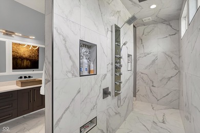 This home is an absolute showstopper-a modern masterpiece tucked on Dyes Walk Golf Course in Indiana - for sale on GolfHomes.com, golf home, golf lot