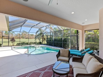 This wonderful 3-bedroom home with SPACIOUS BONUS ROOM, HEATED on Pelican Pointe Golf and Country Club in Florida - for sale on GolfHomes.com, golf home, golf lot