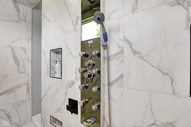 This home is an absolute showstopper-a modern masterpiece tucked on Dyes Walk Golf Course in Indiana - for sale on GolfHomes.com, golf home, golf lot