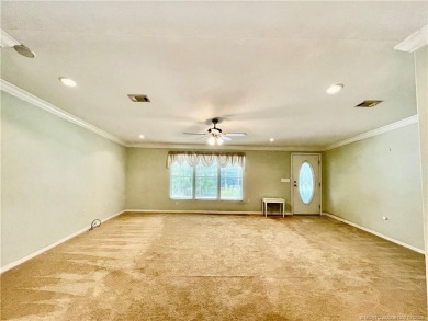 This home truly has it all! 3 bedrooms/2 bath + bonus room on Indianwood Golf and Country Club in Florida - for sale on GolfHomes.com, golf home, golf lot